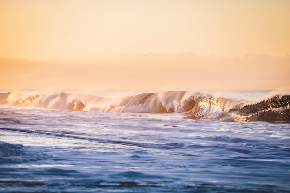 a couple of large waves in the ocean