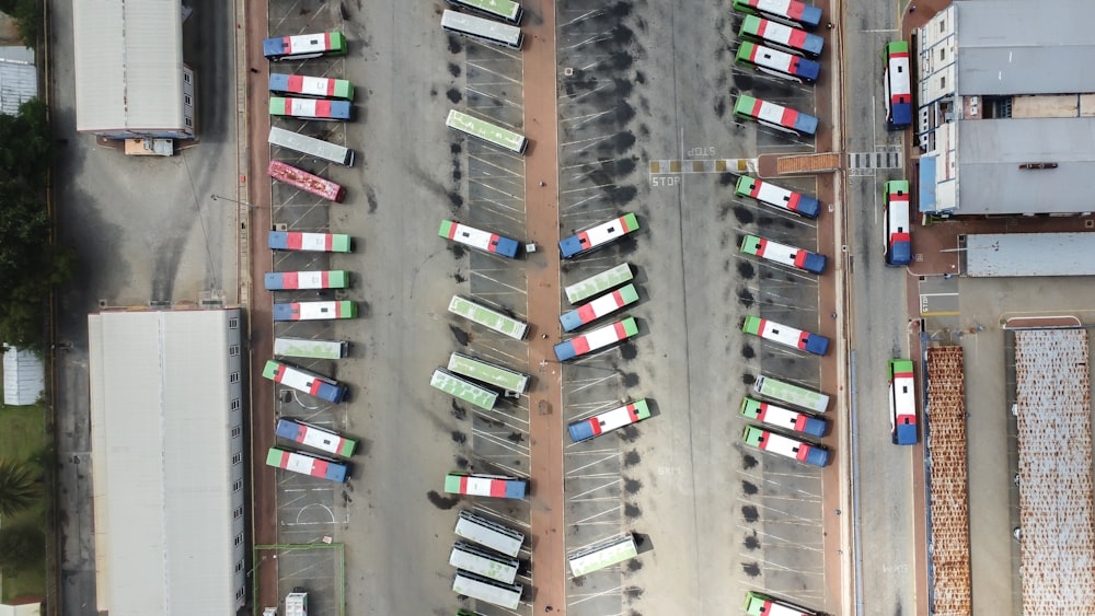 an aerial view of a parking lot filled with cars