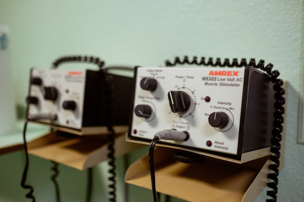 a couple of electronic devices sitting on top of a counter