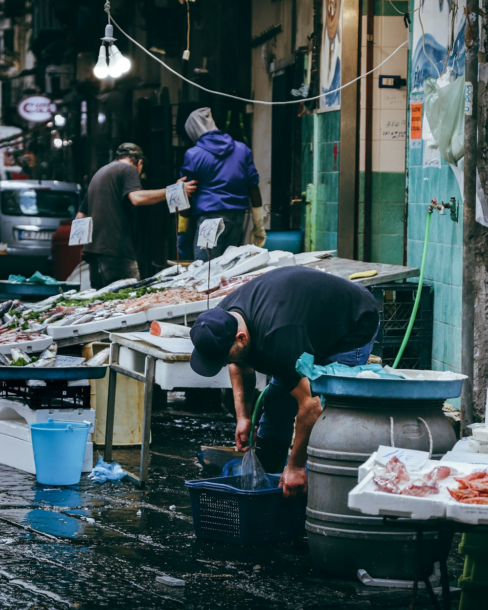 a man is washing his hands in the water