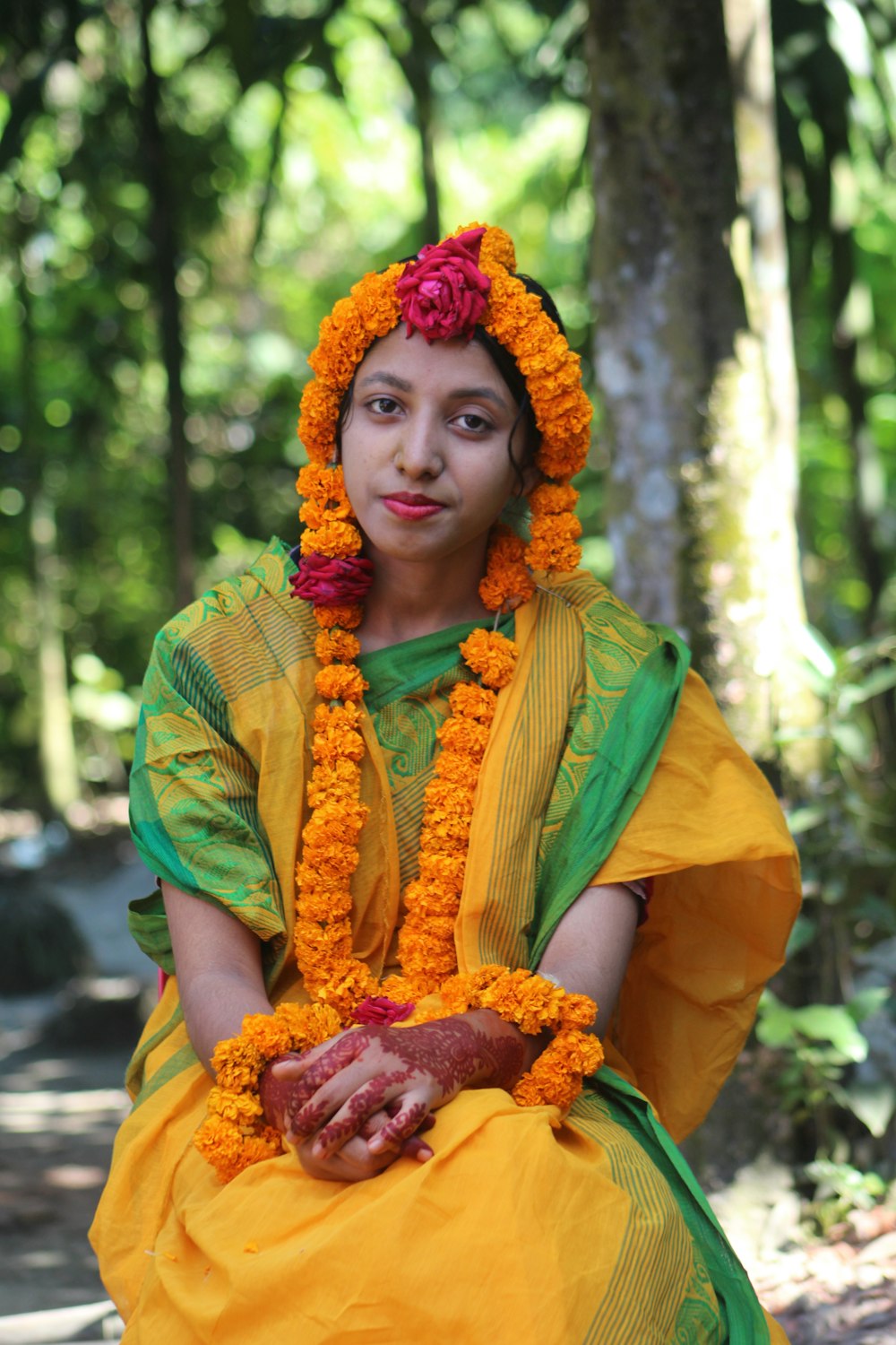 a woman dressed in a yellow and green outfit