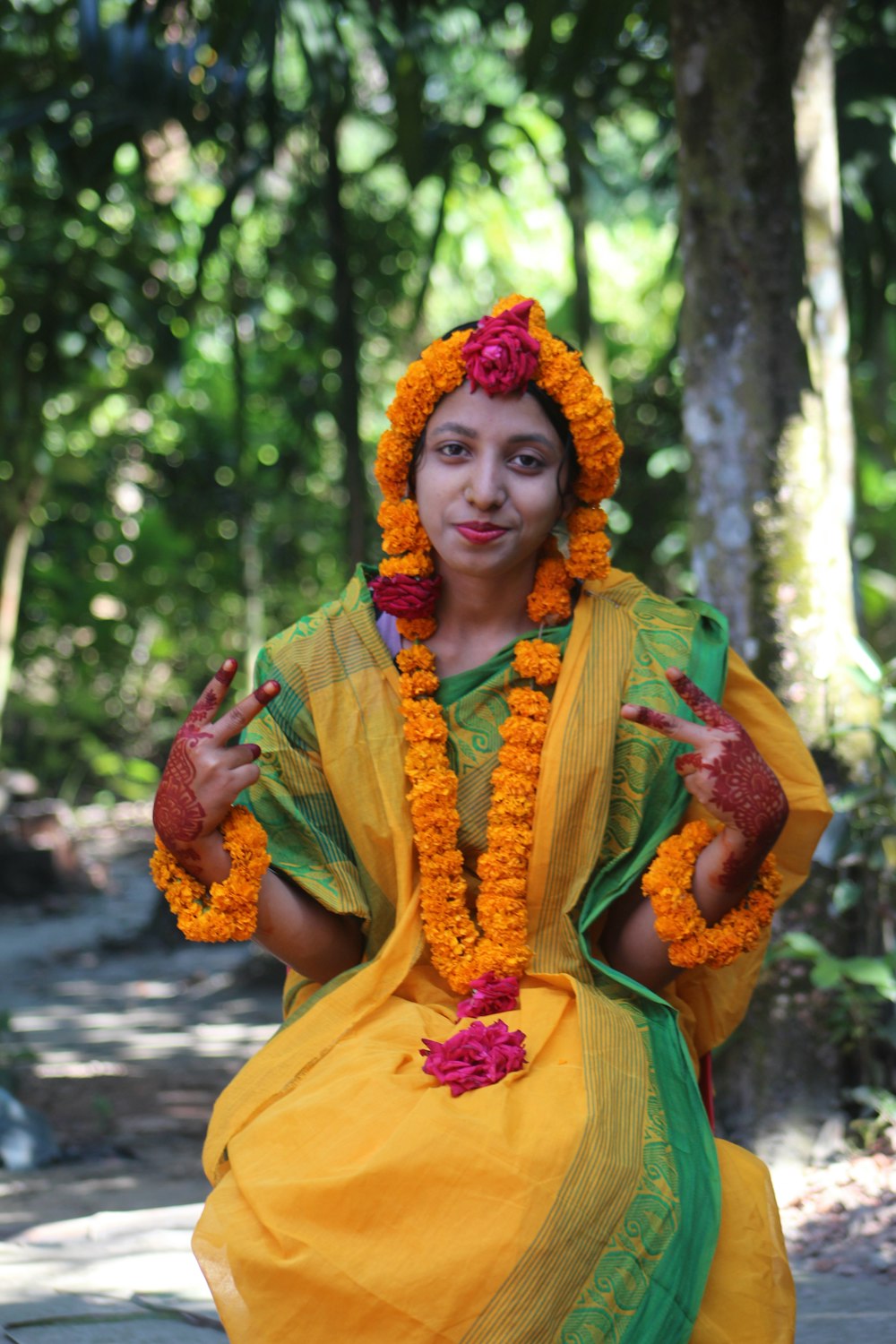 a woman dressed in a yellow and green outfit