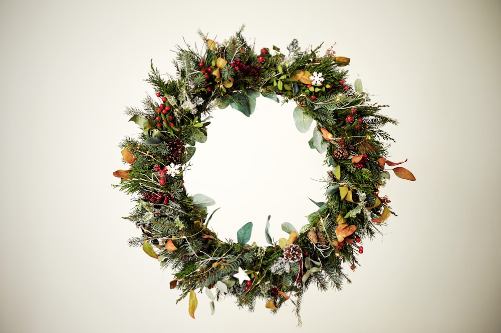 a christmas wreath with a white background