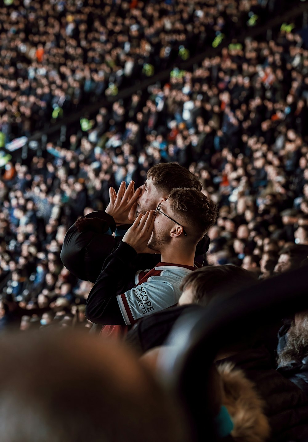 a man standing in front of a crowd of people