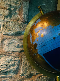 A colorful digital globe highlighting multiple languages with Islamic motifs.