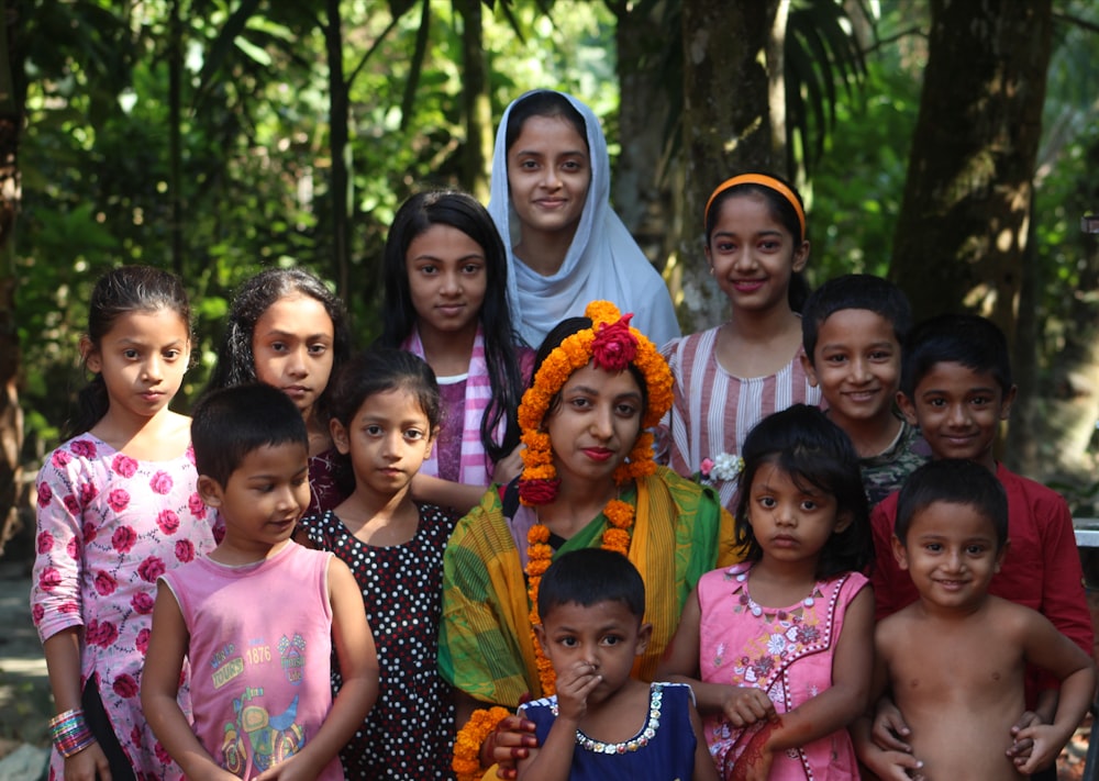 a group of children standing next to each other