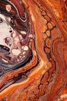 Expressive painting featuring flowing lines and warm earth tones.