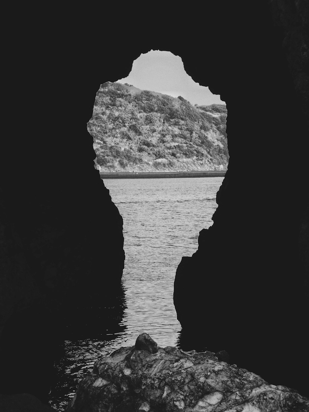 a black and white photo of a body of water