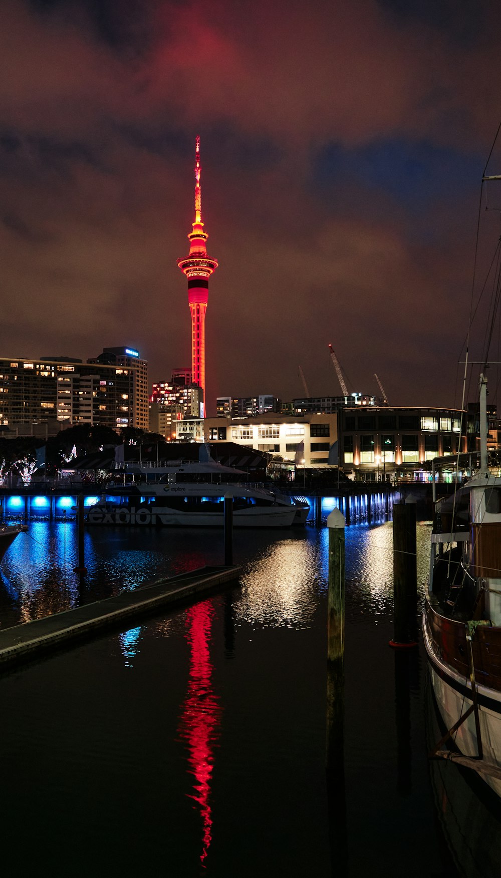 a view of a city at night from the water