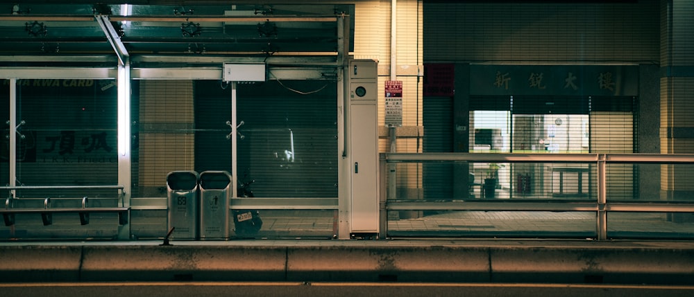 a parking meter sitting in front of a building