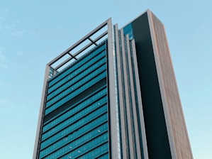 a tall building with a sky background