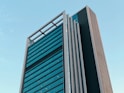 a tall building with a sky background