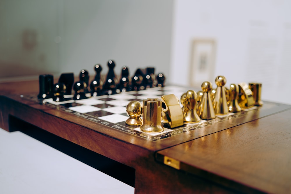 a close up of a chess set on a table