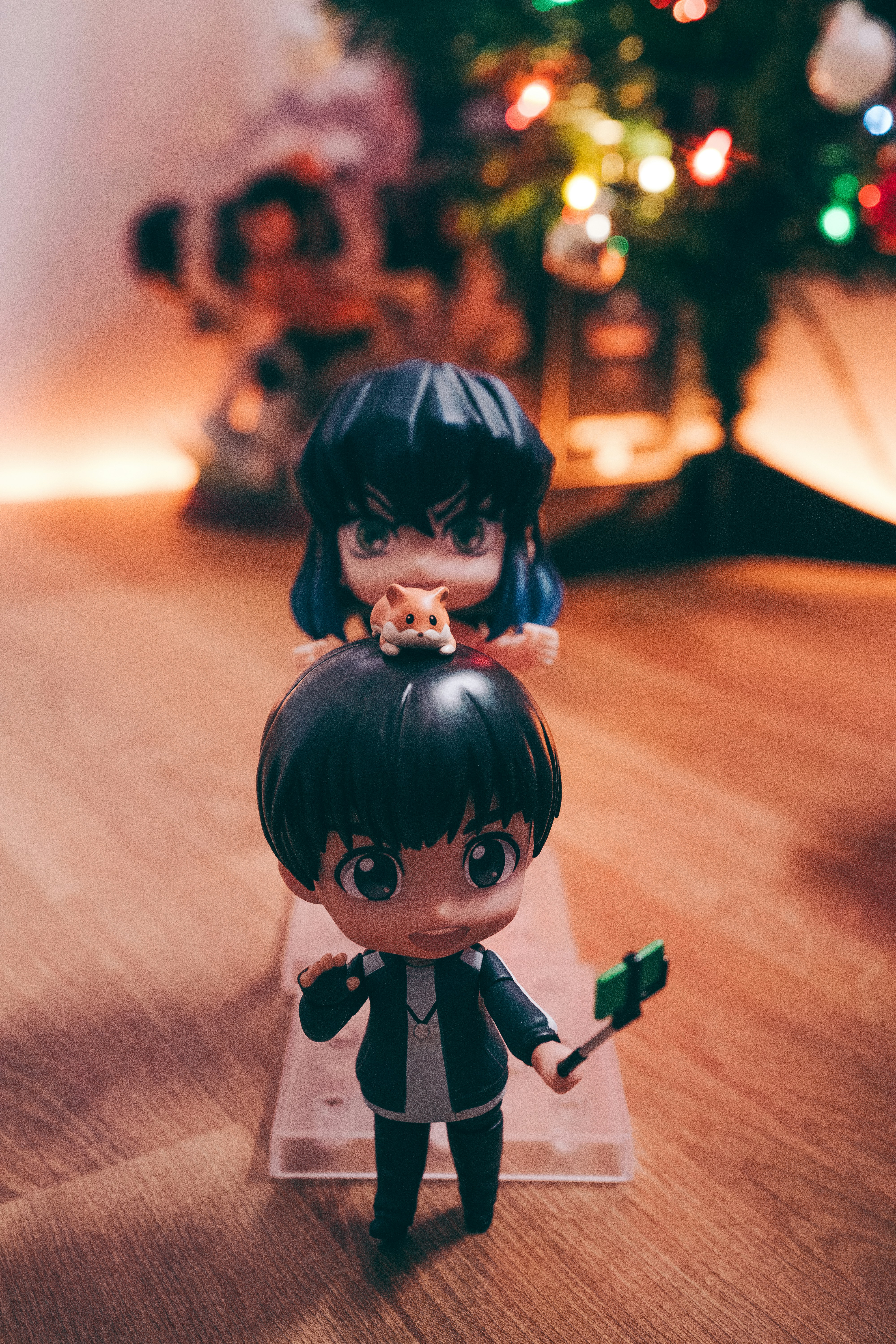 A couple of figurines sitting on top of a table photo – Free Doll Image ...