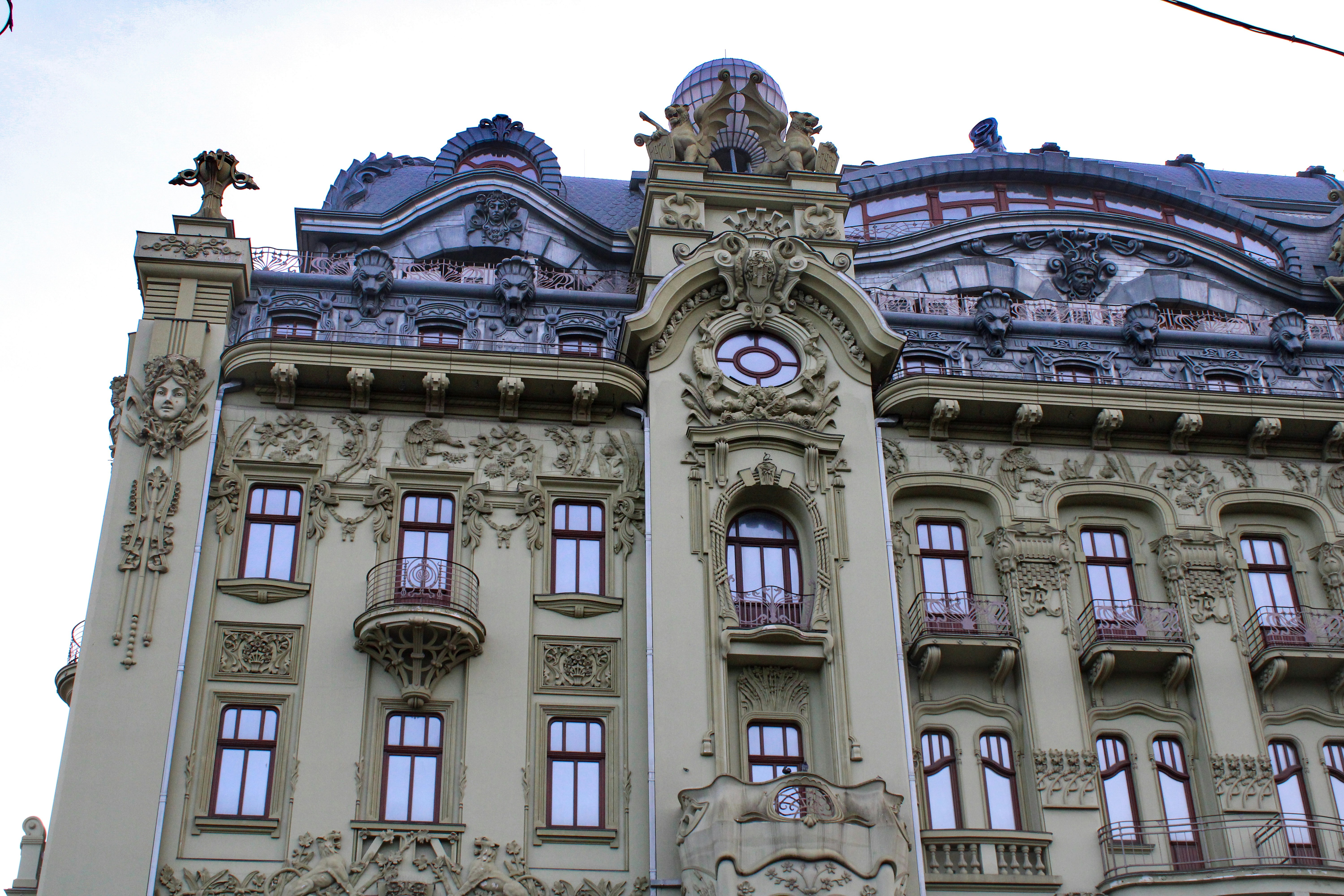 a large building with a clock on the front of it