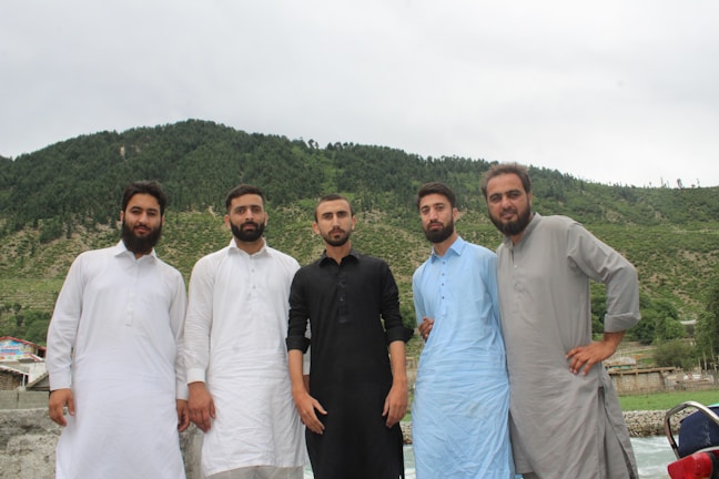 A group portrait of the ten clan leaders during a traditional quarterly gathering.