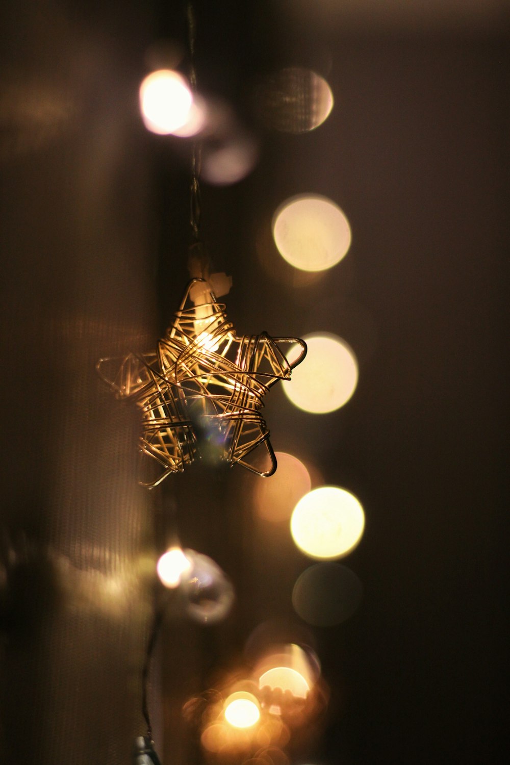 a string of lights hanging from a ceiling