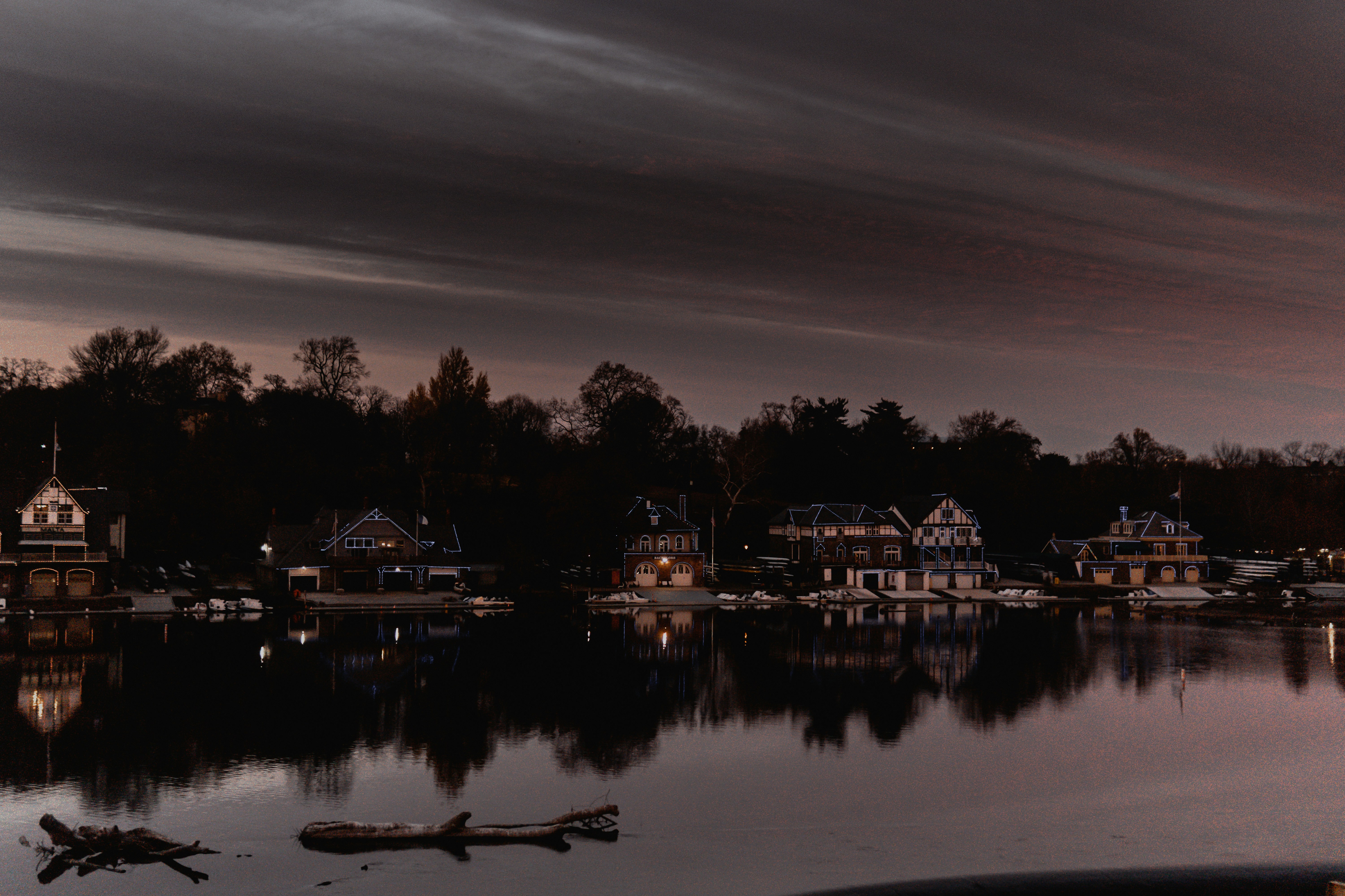 a body of water with a bunch of houses in the background