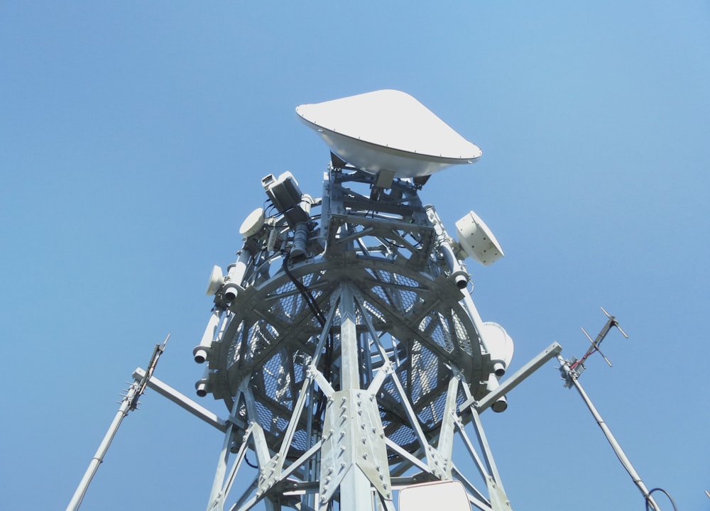 a very tall tower with a lot of antennas on top of it