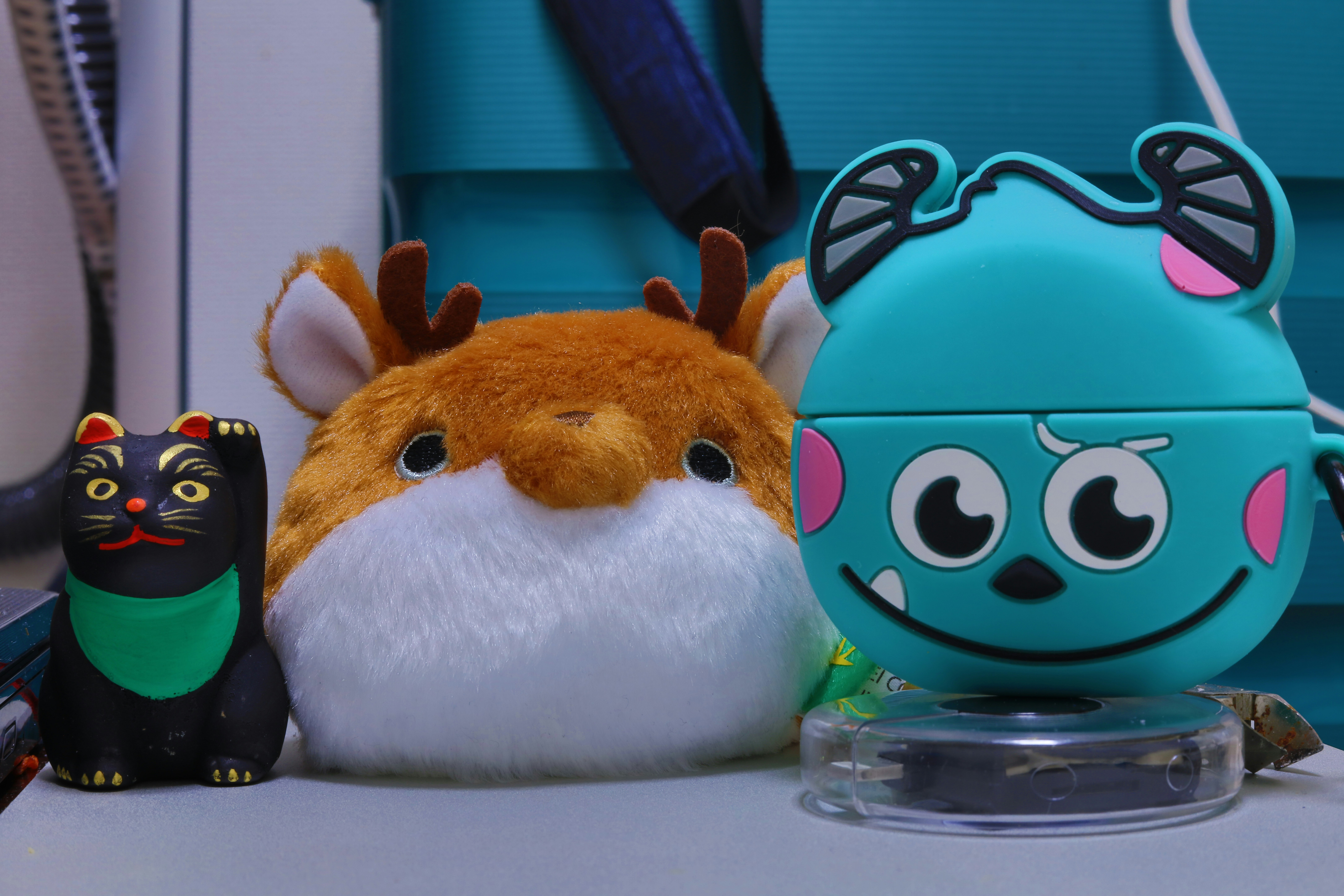 a couple of stuffed animals sitting on top of a table