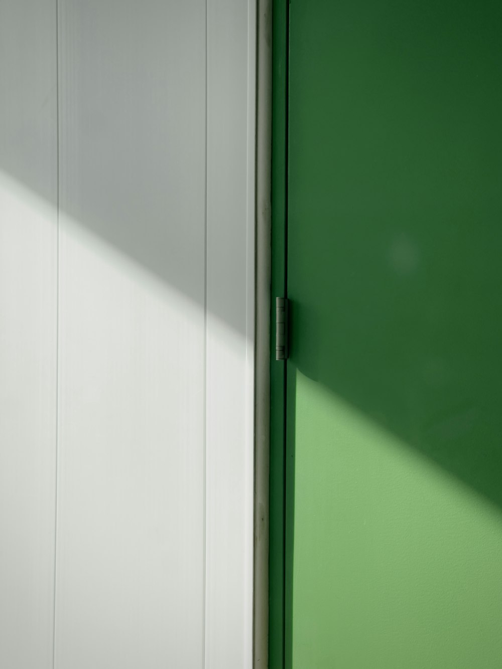a close up of a green door
