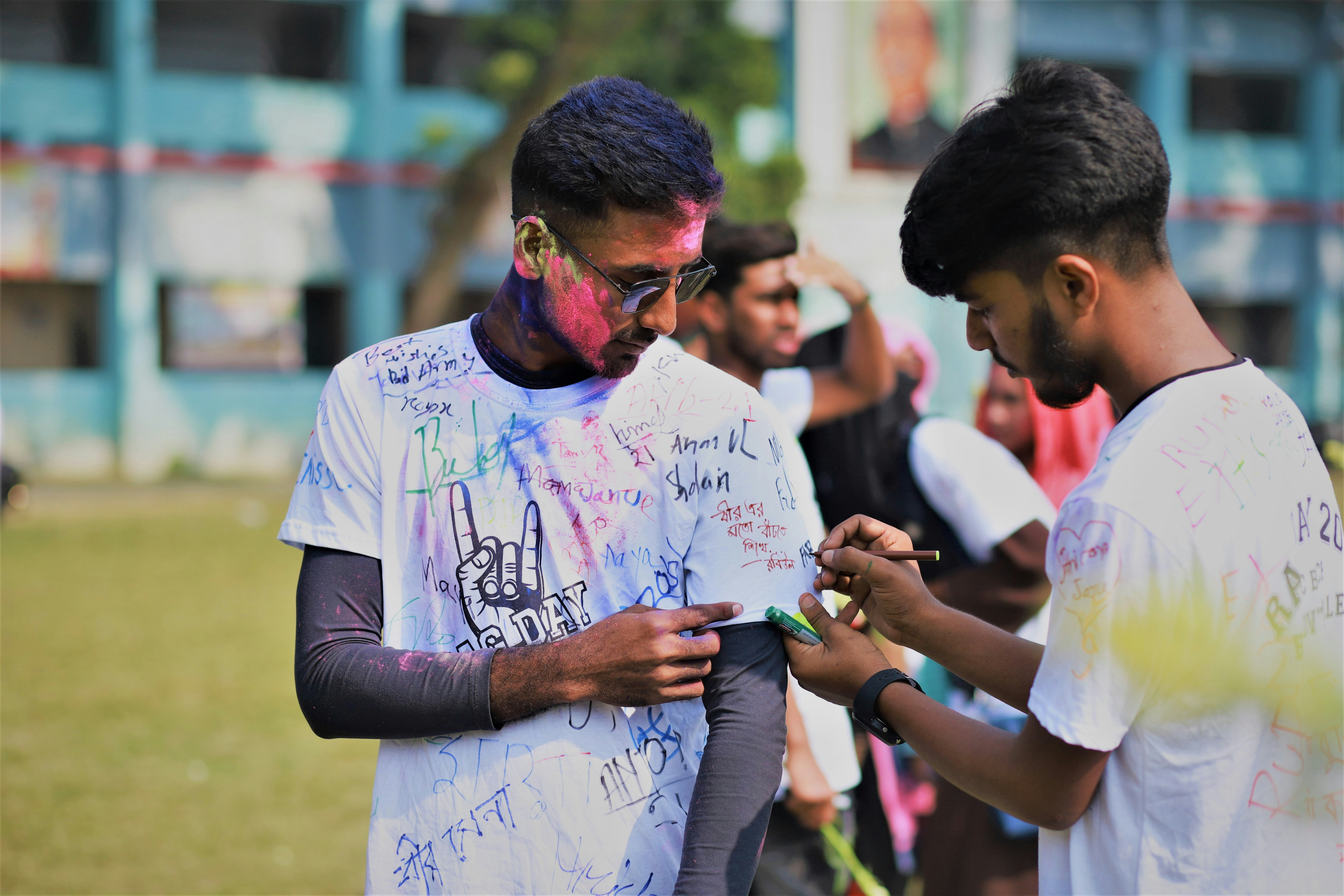 a group of young men standing next to each other