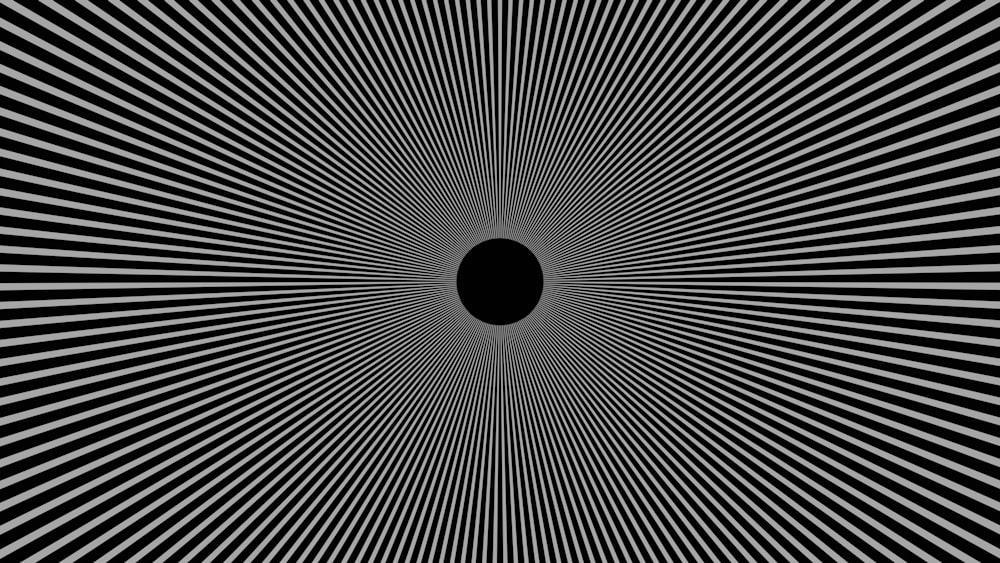 a black and white image of a black hole