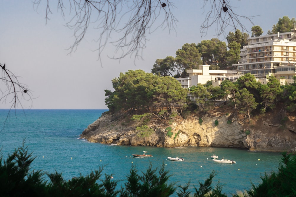 a view of a beach with boats in the water