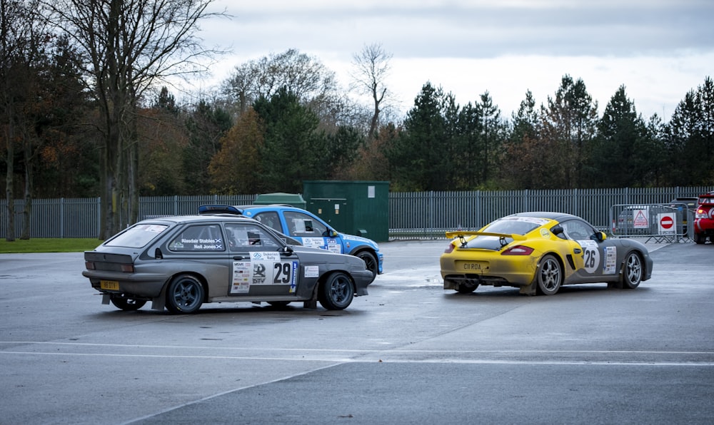 a couple of cars parked in a parking lot