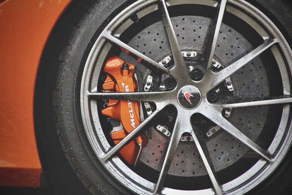 a close up of a wheel on a sports car