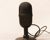 a microphone is plugged into a charger