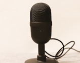 a microphone is plugged into a charger