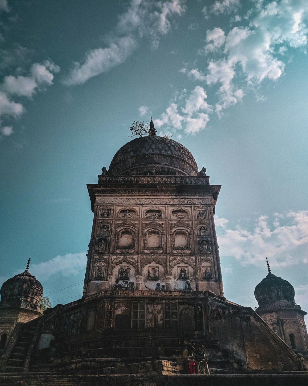 a tall building with a dome on top of it