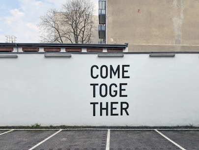 a large white wall with some words on it