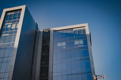 Contemporary office building exterior with glass facade.