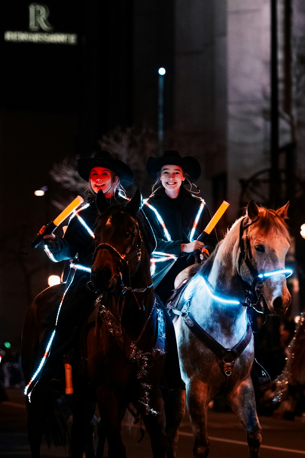 a group of people riding on the back of horses