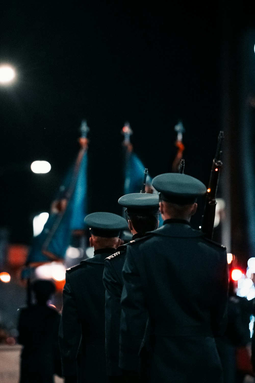 a group of uniformed men standing next to each other