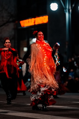 Lucila dancing joyfully at a family gathering with festive decorations