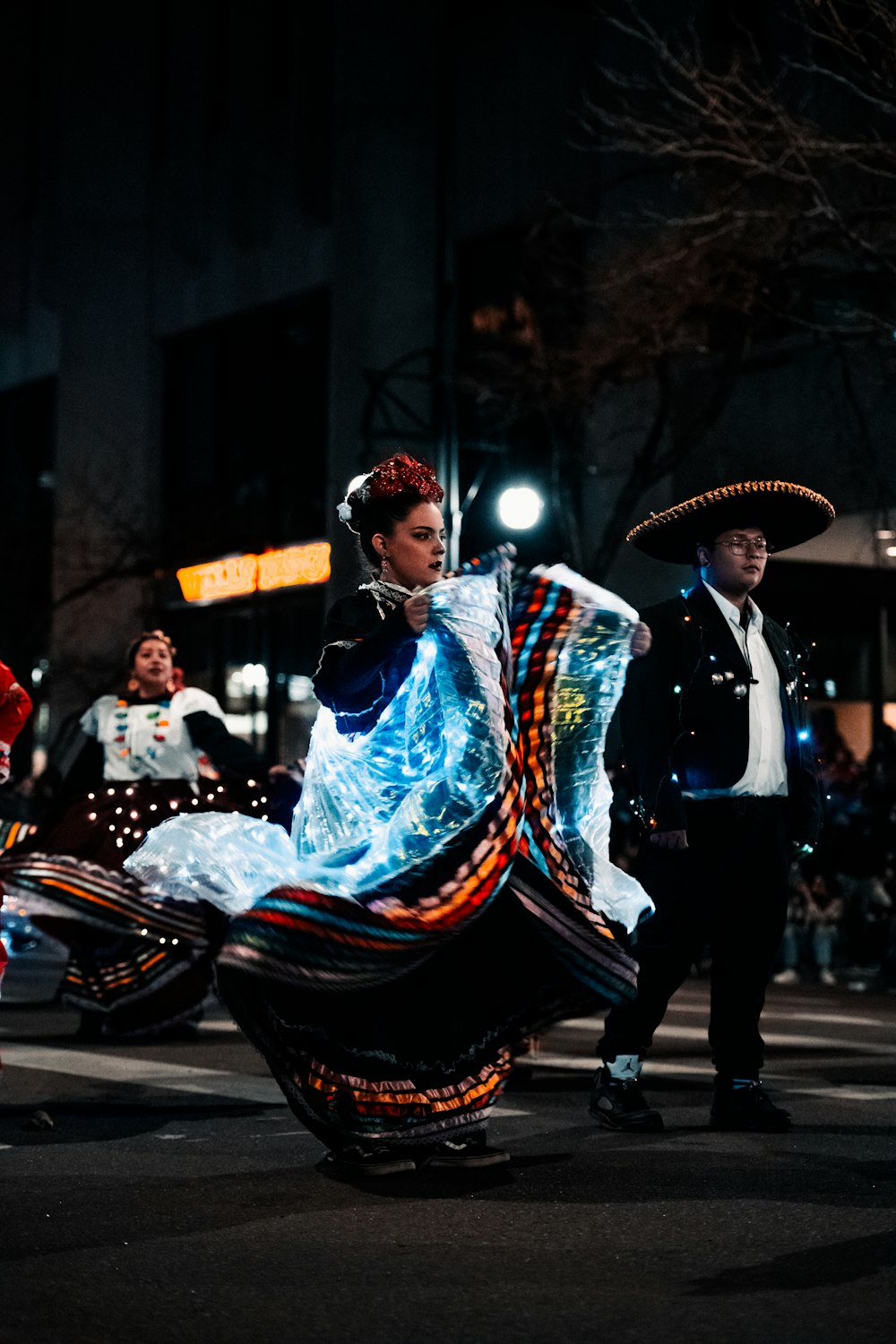 a group of people that are standing in the street