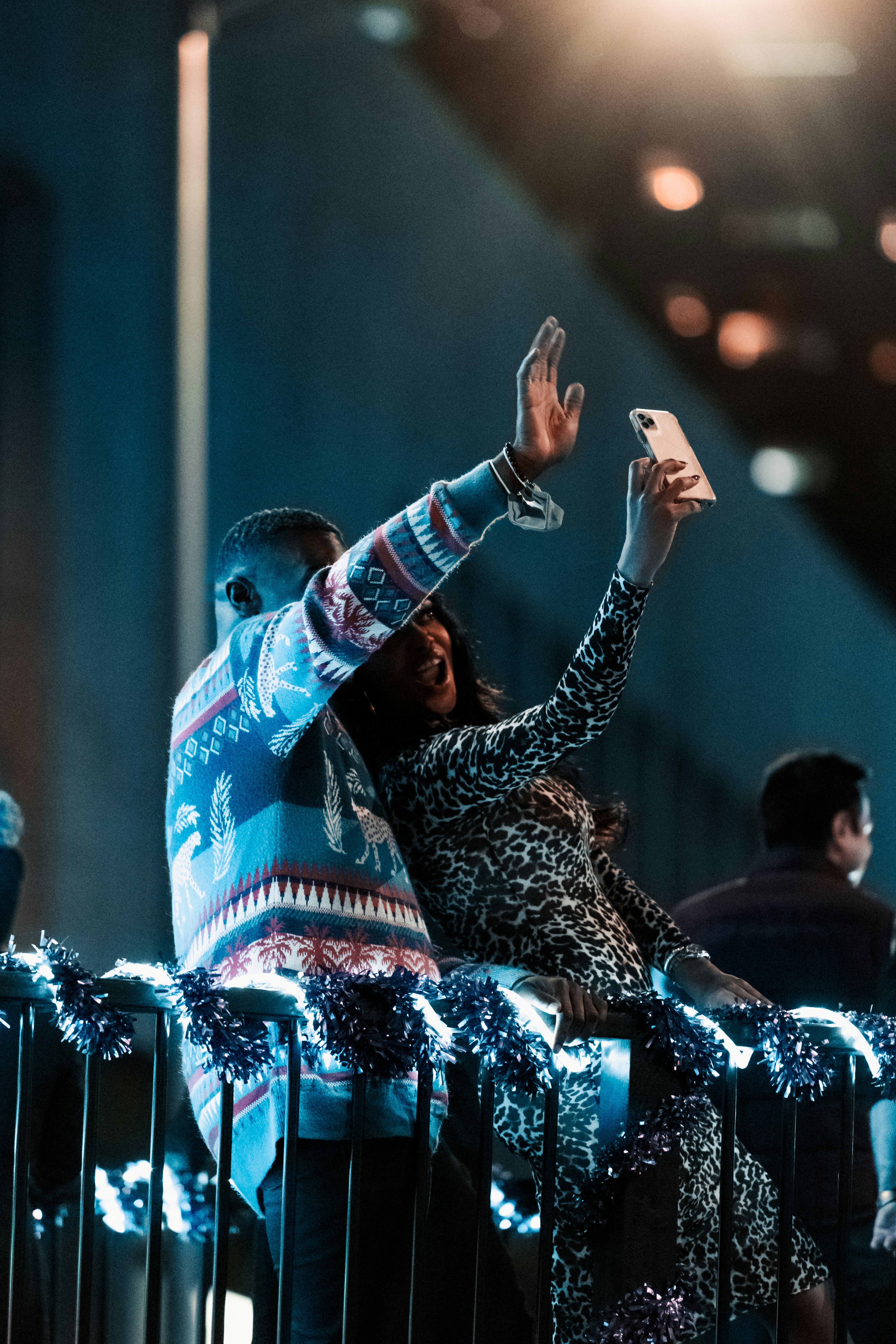 a couple of people standing next to each other