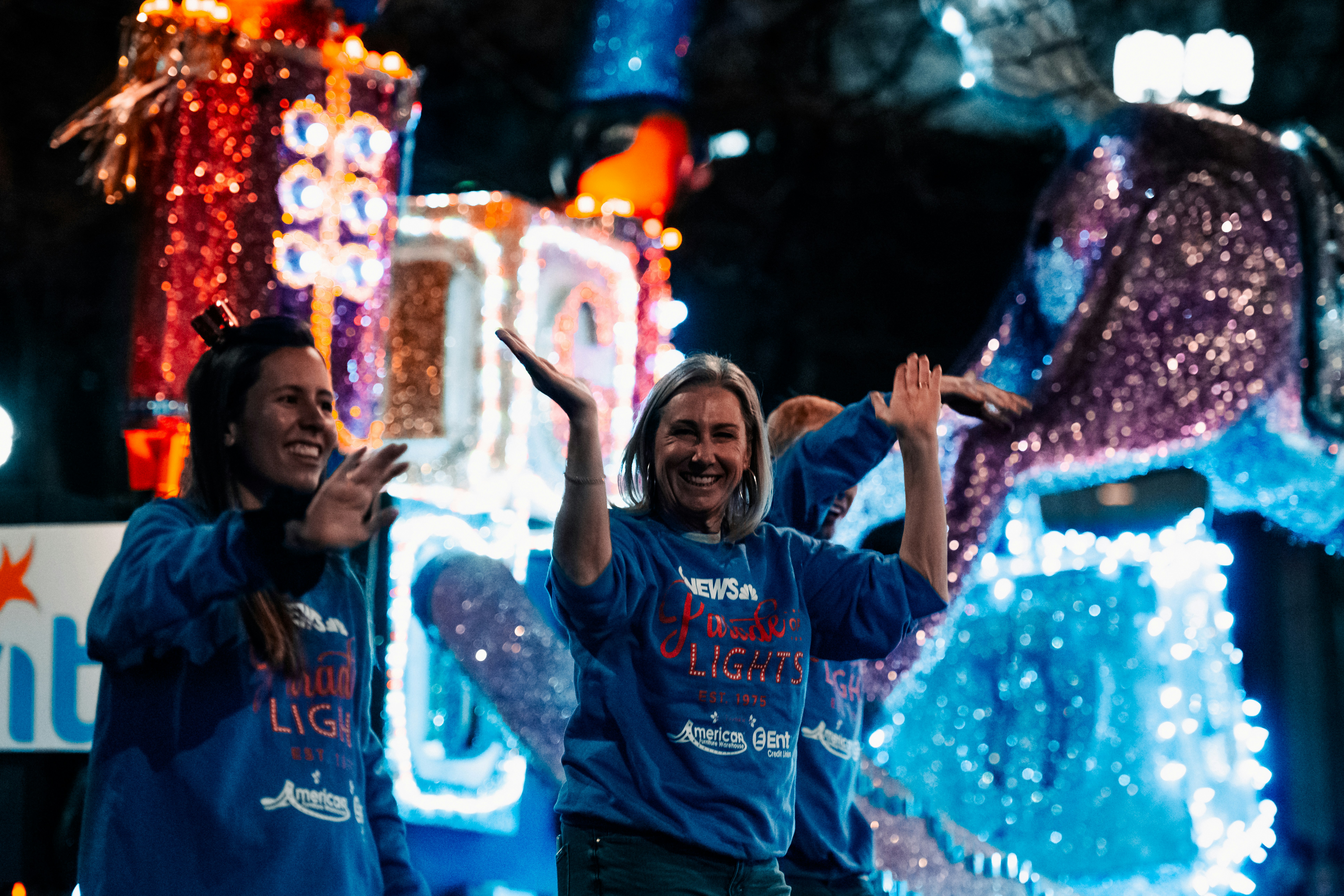 a group of people standing next to each other