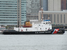 A meeting between Nauticomply advisors and USCG officials discussing regulatory updates.