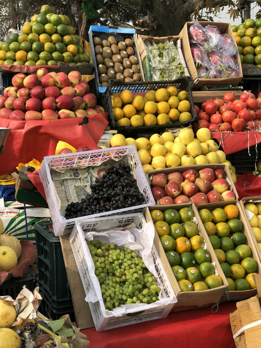 a fruit stand with many different types of fruit