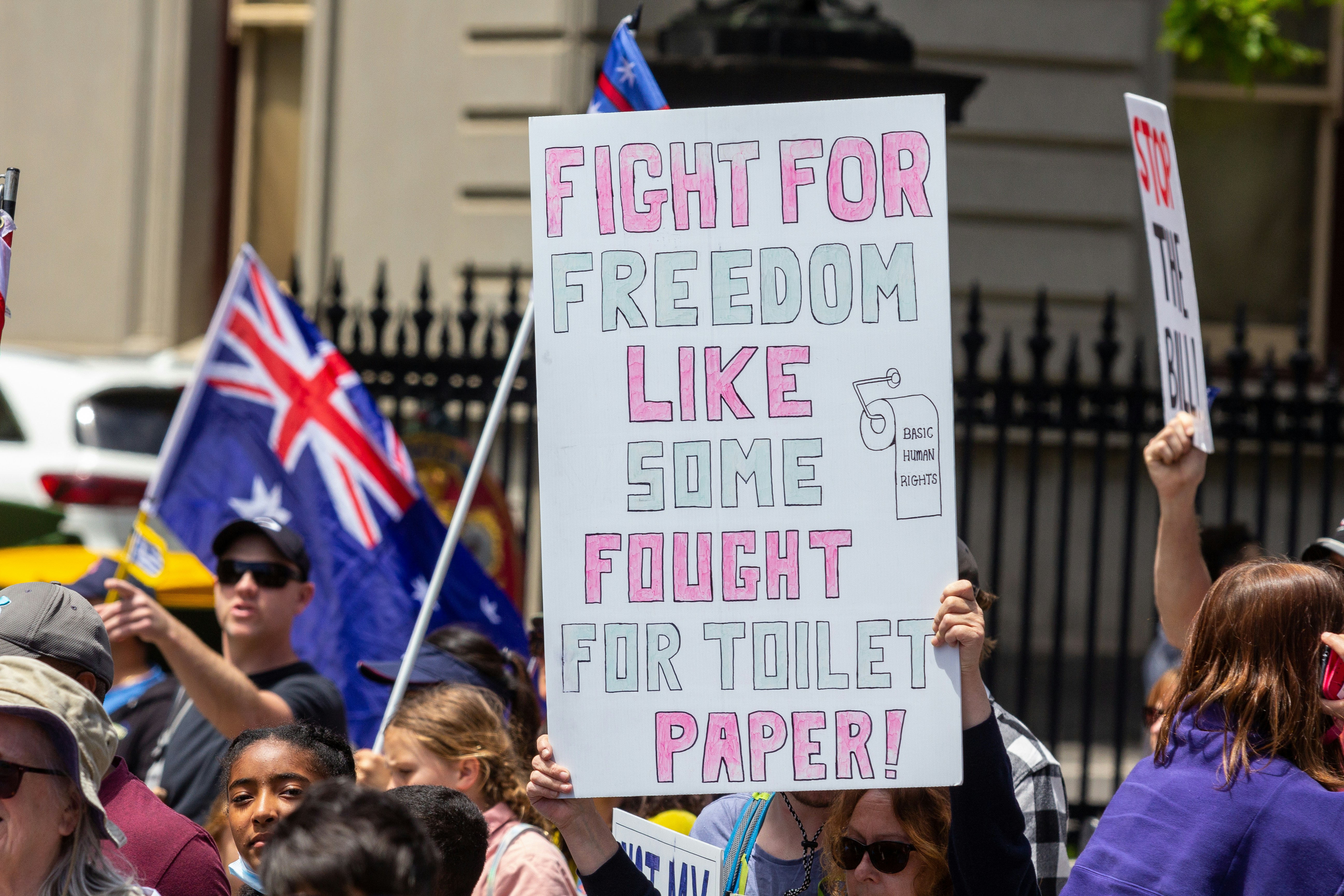 a homemade sign at A sign at Melbourne's Freedom protests rally and march in the city November 20th 2021 - over 200,000 people marched from Parliament to the Flagstaff Gardens. A happy family friendly crowd singing and chanting \