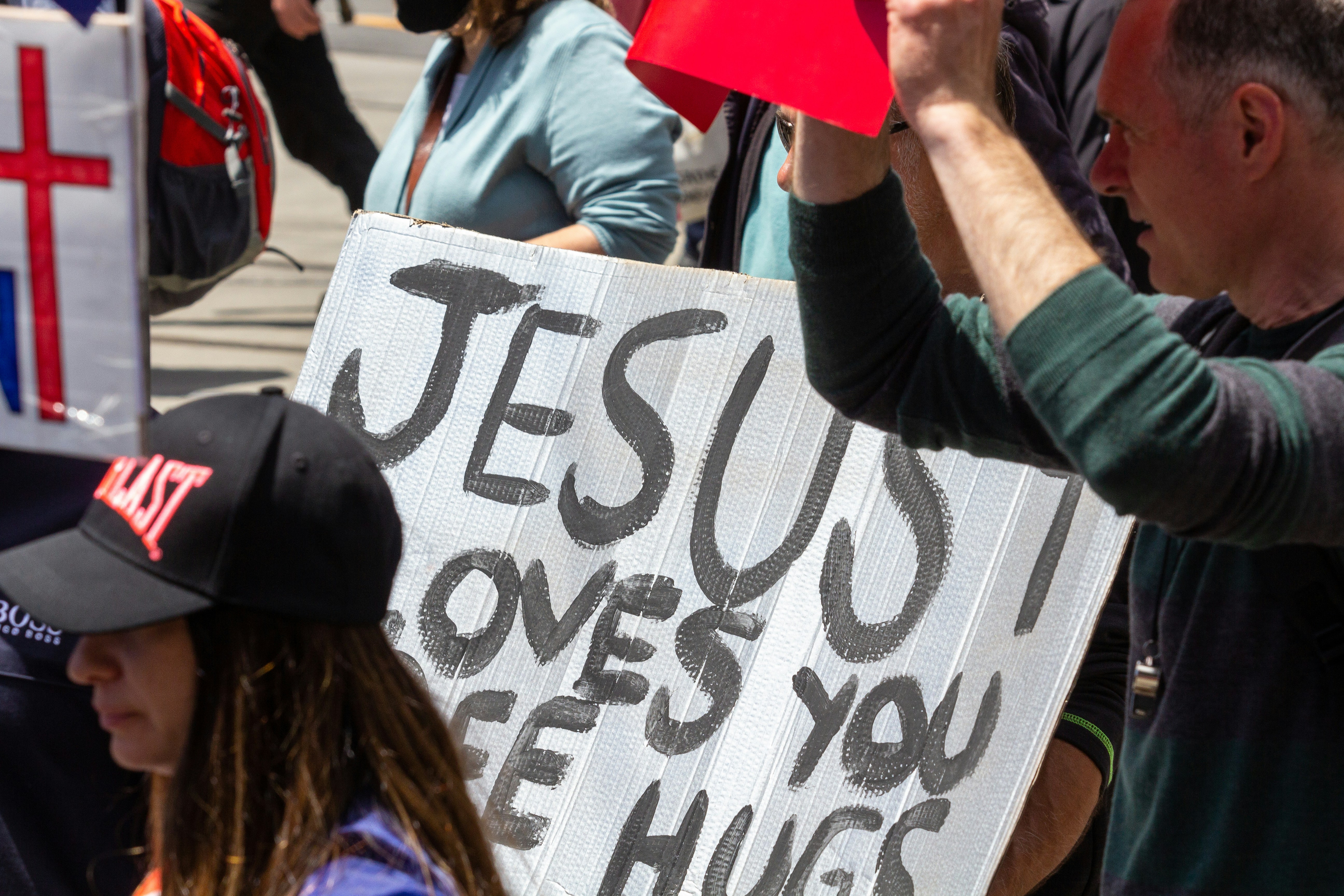 Jesus - Melbourne's Freedom protests rally and march in the city November 20th 2021 - over 200,000 people marched from Parliament to the Flagstaff Gardens. A happy family friendly crowd singing and chanting \