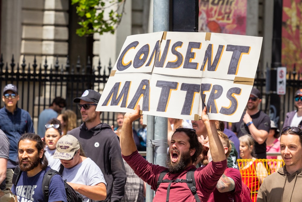 a man holding a sign that says content matters