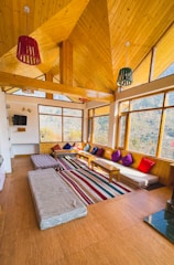 Living area of the family suite featuring local crafts and comfortable seating.