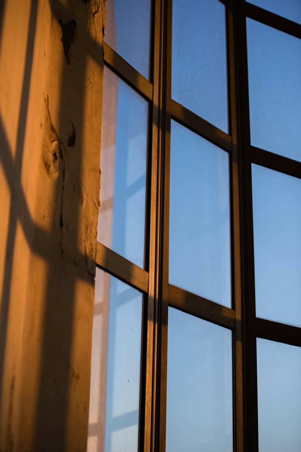 a window with a view of a blue sky