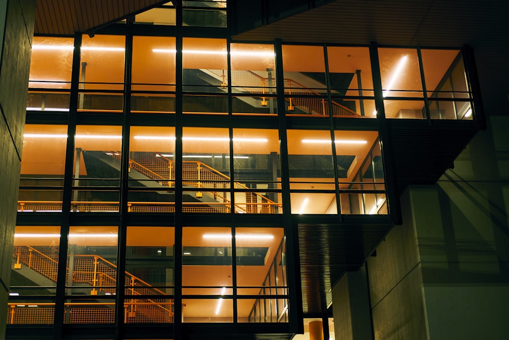 a very tall building with lots of windows at night