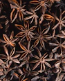 a bunch of star anise on a table